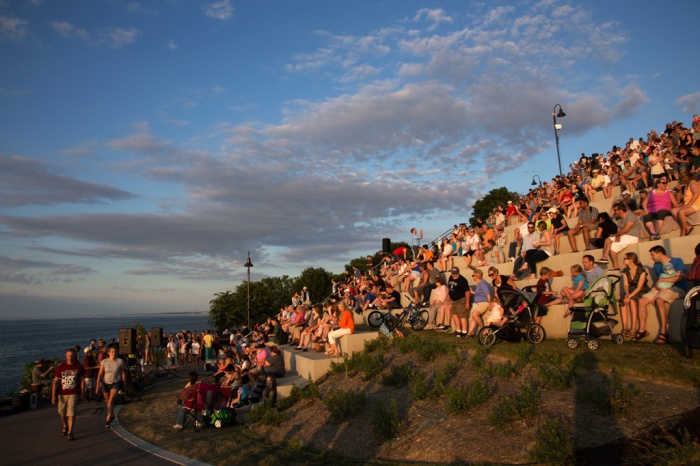 Photo: Celebration attendees cover the Lakewood Park Solstice Steps as they watch the Lake Erie Sunset. Photo by James Guilford.