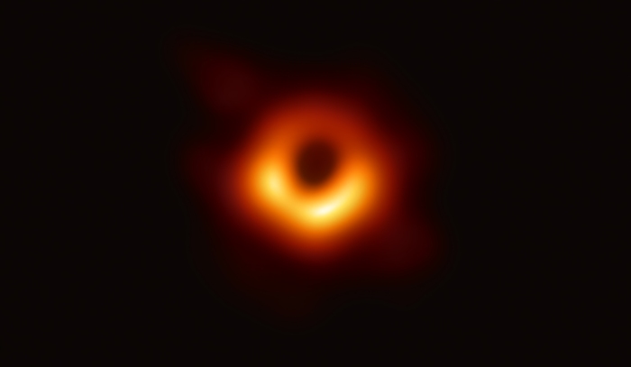 Photo: Using the Event Horizon Telescope, scientists obtained an image of the black hole at the center of galaxy M87, outlined by emission from hot gas swirling around it under the influence of strong gravity near its event horizon. Credit: Event Horizon Telescope collaboration et al.